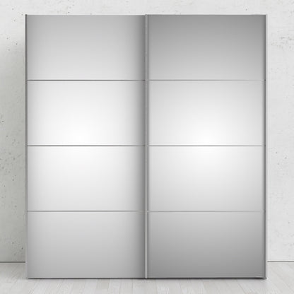 La collection 'Patsy'. Armoire coulissante 180 cm en chêne avec portes miroir et 5 étagères