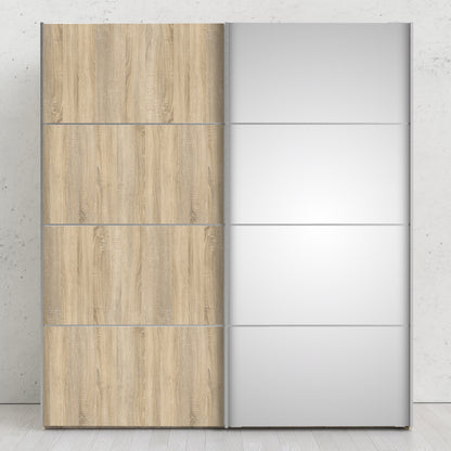 La collection « Patsy ». Armoire coulissante 180 cm en chêne avec portes en chêne et miroir avec 5 étagères